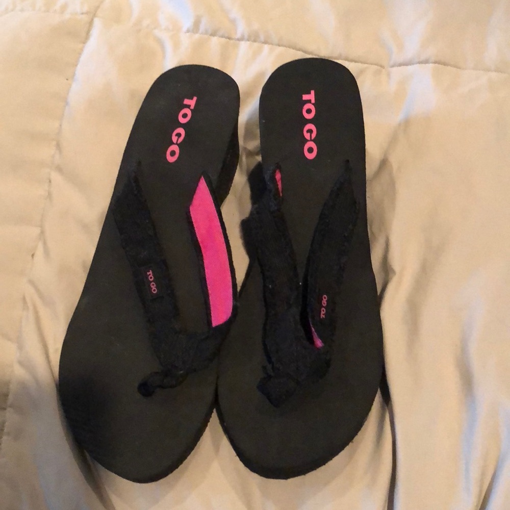 Black wedge flip flops